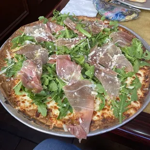 Gluten free pizza with prosciutto and arugula!