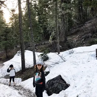 Unclear, snow covered trail late April. Winding trail on an incline.