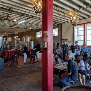 a large group of people sitting at tables