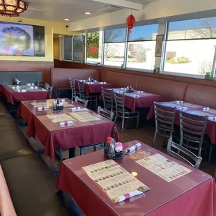 tables with red tablecloths