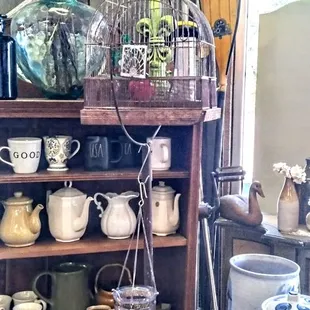 Collectible tea pots and freestanding  bird cage even a unicycle  if you looking to  take up a new sport.