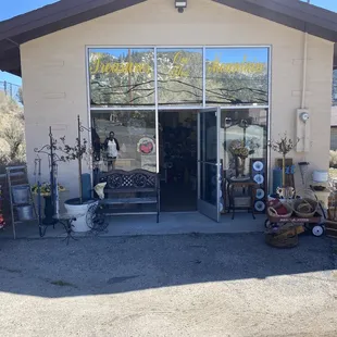 Front of the store with a mixture of outdoor decor