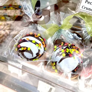 a display of chocolate covered donuts