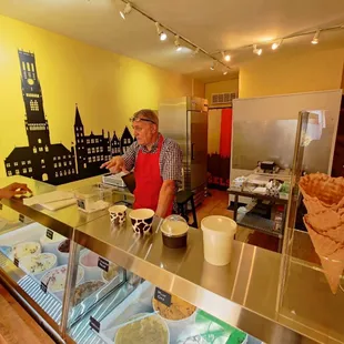 a man behind a counter