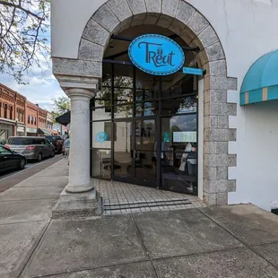 the front entrance of a restaurant