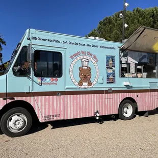 a blue and pink food truck