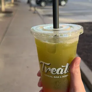 Kiwi fruit tea with strawberry popping boba