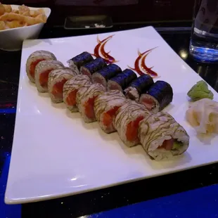 White tiger roll (foreground), tuna scallion roll in back