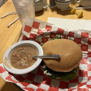 A burger and supposedly vegetables