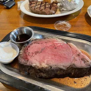 Prime rib and New York Strip with steamed veggies and baked potatoes!