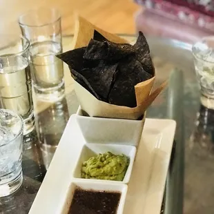 a square plate with chips and dips