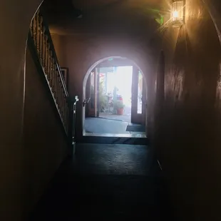 The entrance &amp; the patio out back...