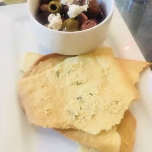 The warm olives came with fresh baked parmesan crackers. Excellent. Get it.