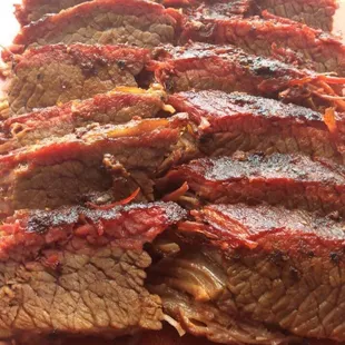 sliced beef on a cutting board