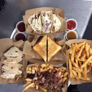 Street tacos, quesadilla, queso fries, pulled pork grilled cheese
