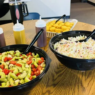 Cucumber tomato salad, cole slaw, sauces
