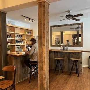 a man sitting at a bar