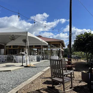 outdoor seating area with tables and chairs