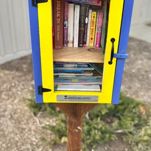 Little Free Library, our 6 year old picked out a Kitten Coloring Book! =^.^=