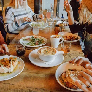 a group of people eating at a table