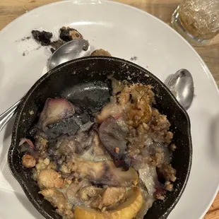 Apple pear crisp w/cast iron residue staining the food.