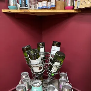 a shelf of wine bottles