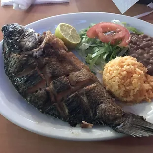 Whole fried fish, rice, and beans. This is my go to .