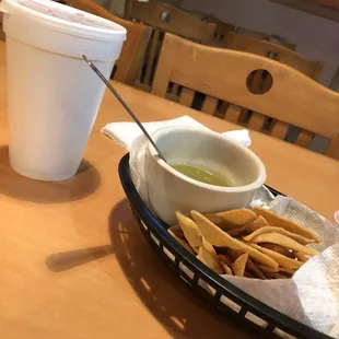 Home made tortilla chips and delicious salsa verde.