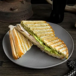 a sandwich cut in half on a plate