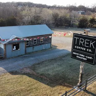 a sign for trek coffee co