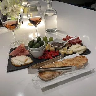 Charcuterie board and rose