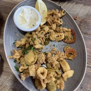 What&apos;s left of our calamari appetizer. It was very lightly fried. Not heavy like most places