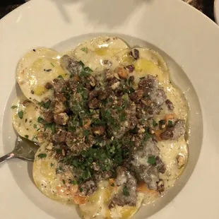 Butternut squash and pumpkin ravioli with sausage o  top NOM