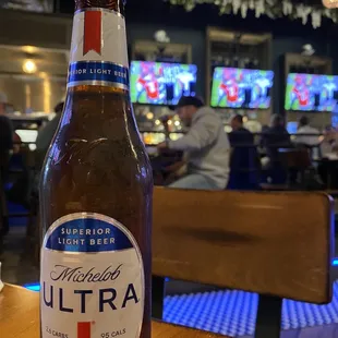 a bottle of beer on a table
