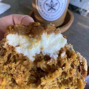 Pumpkin spice muffin with cream cheese frosting
