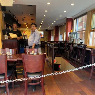 a man standing at the bar