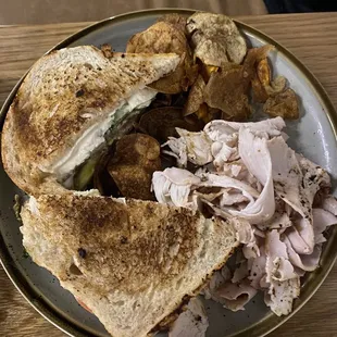 Tomato mozzarella and avocado with turkey on the side.
