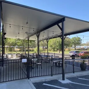 They&apos;ve upgraded the outdoor dining space-with a permanent cover. Nice!