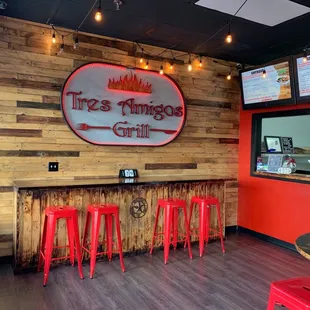 Inside entrance, order counter and menu