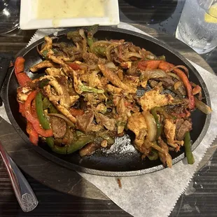 a skillet of food on a table