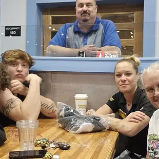 Table with family and manager