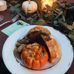 Beef Wellington, fingerling potatoes and a mini pumpkin filled with delicious root veggies and CHEESE! So good!