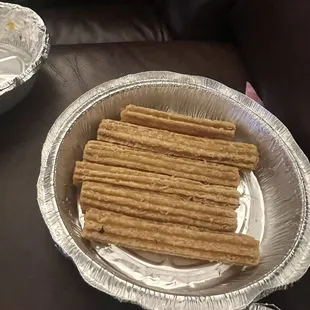 Churros without the cinnamon sugar, chocolate sauce, caramel sauce &amp; whipped cream. I did not order it like this on purpose!