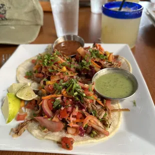 Carnitas tacos and margaritas