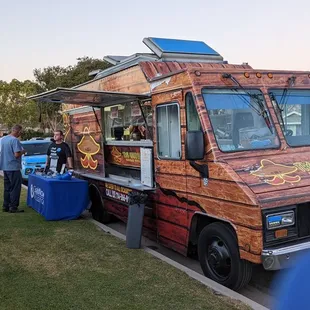 The food truck outside a promotion for gigabit now.