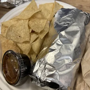Chicken burrito side of chips and house hot salsa