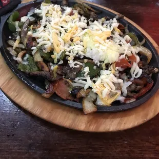 My daughter got the fajitas. She is 12 and really picky. She ate most of it!