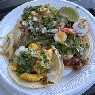 Three amazing tacos: pollo, carnitas and and adobada.