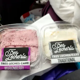 two cakes in plastic containers