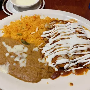 Two chicken tamales, rice and beans combo 15
